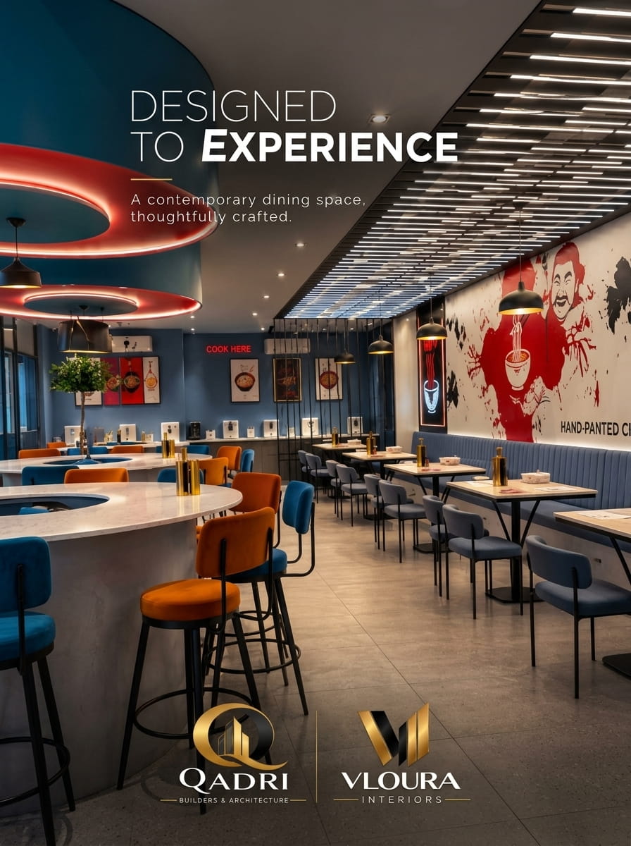 Restaurant interior with curved counter, neon artwork and linear ceiling lighting